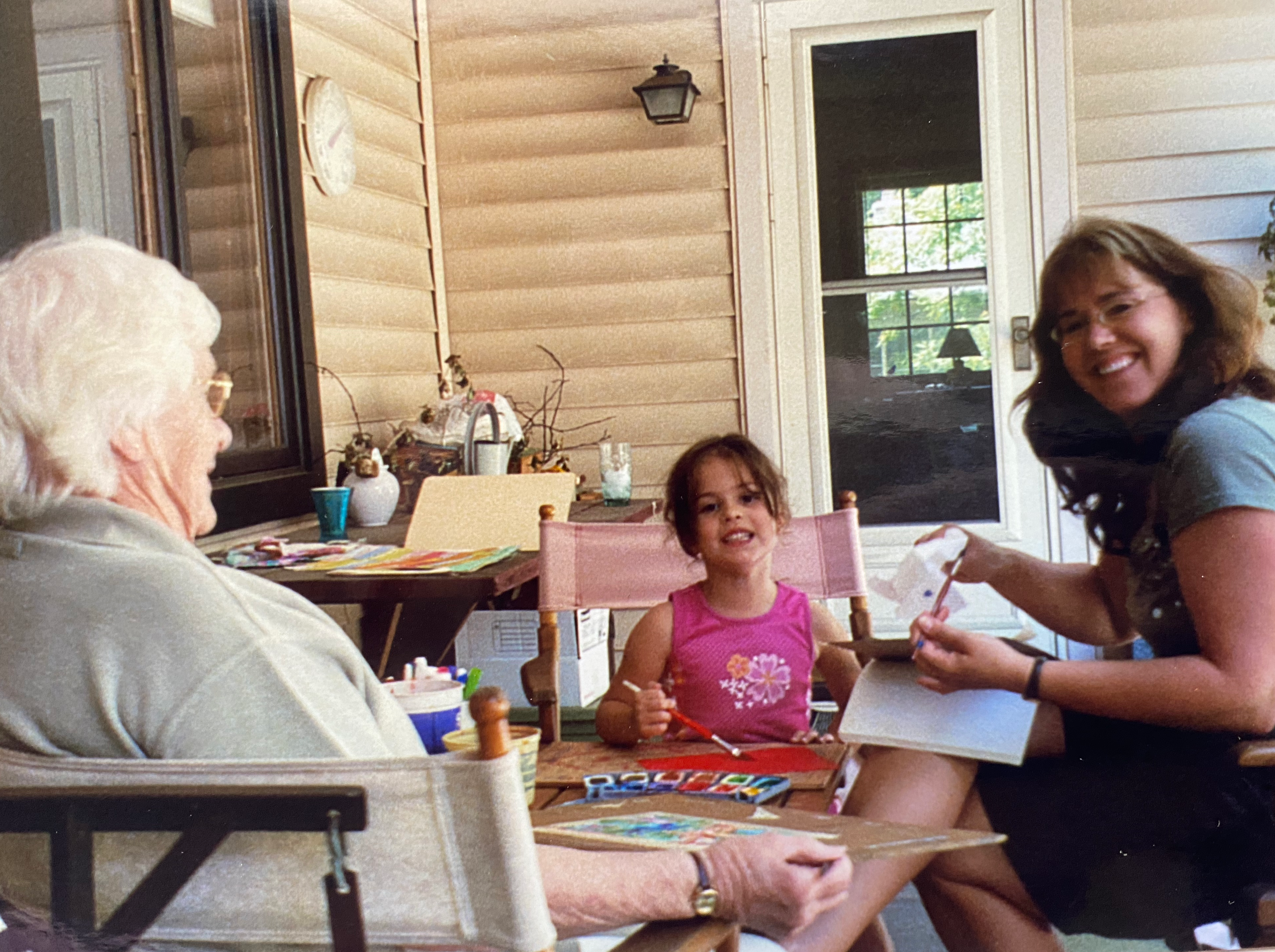 Alissa Campbell painting with family